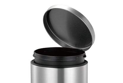 Sleek flat-topped round step bin with stainless steel pedal